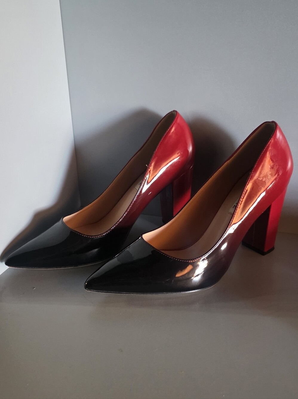 Pointed-Toe Chunky Heel Pumps in Black and Red